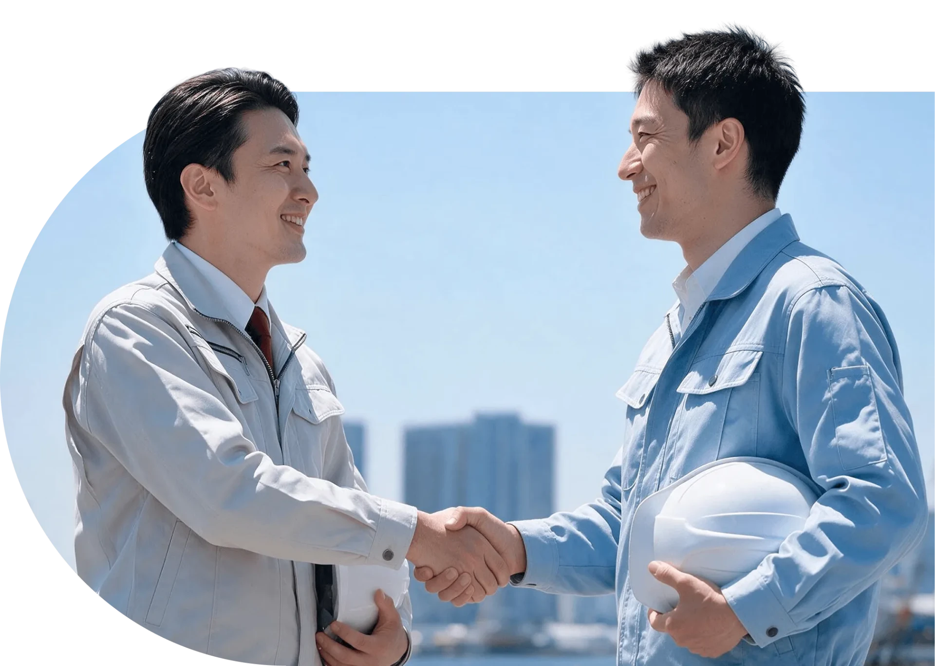 A Smart のパートナー企業と握手するアシオットの担当者